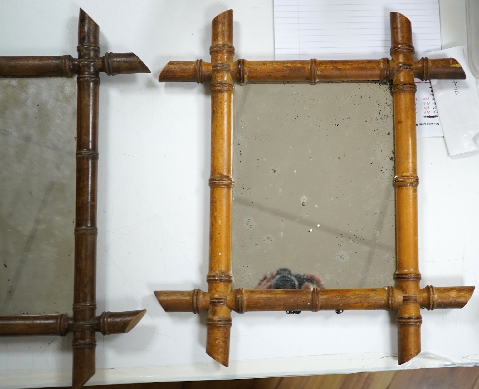 A near pair of small French faux bamboo wall mirrors